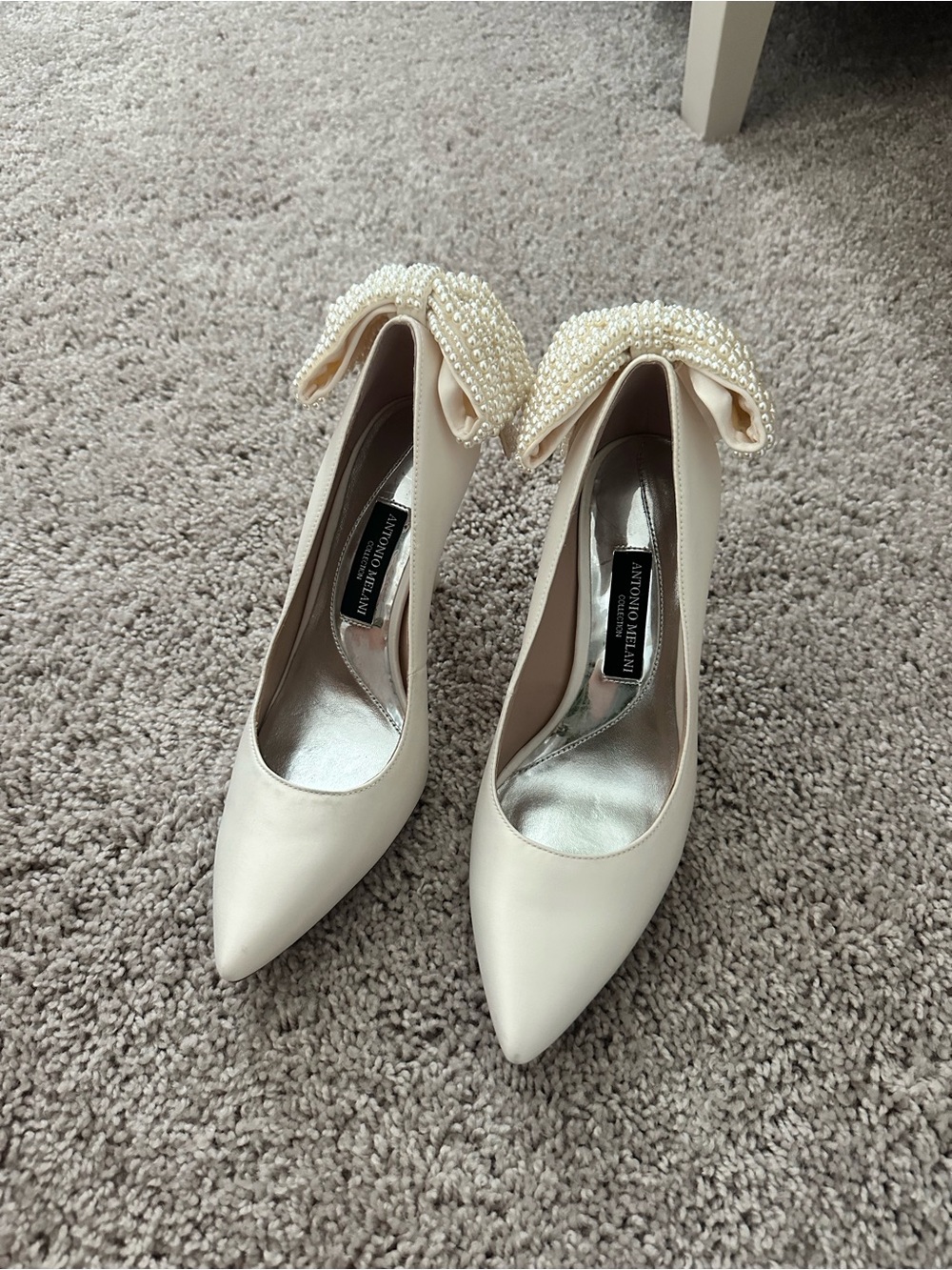 ANTONIO MELANI Ivory Pointed-Toe Pumps with Pearl Bow